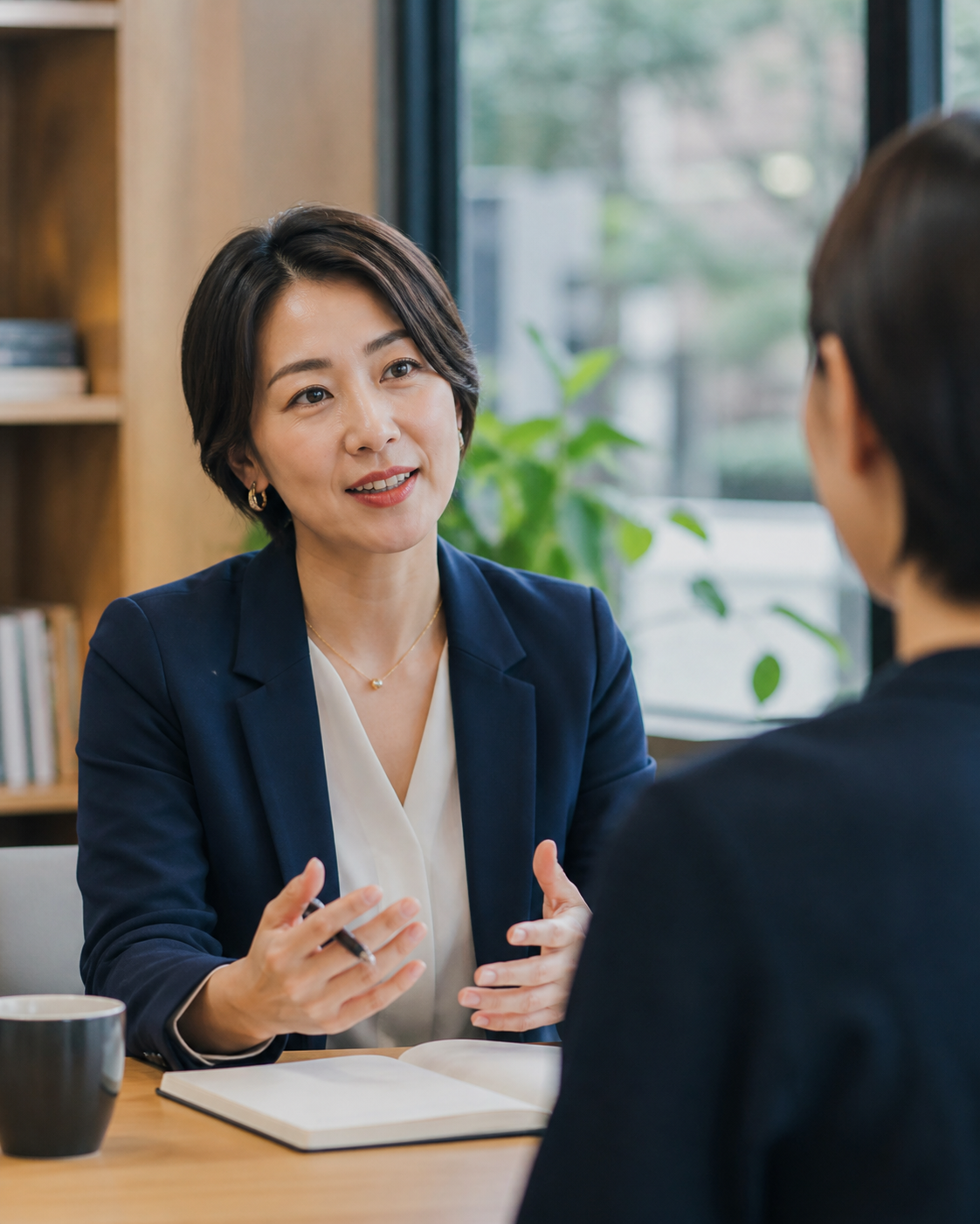 Professional Asian executive coach in session